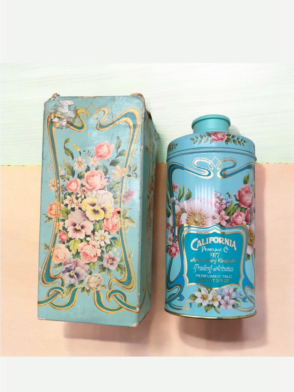 Vintage 1977 “Trailing Arbutus” California Perfume Co. Blue Floral Perfumed Talc